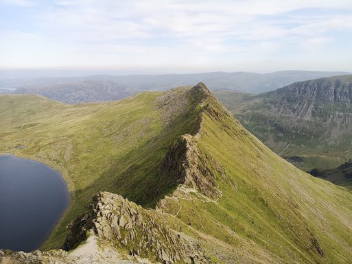 Striding edge mountain peak near a lake with a blu 2025 02 09 02 53 29 utc