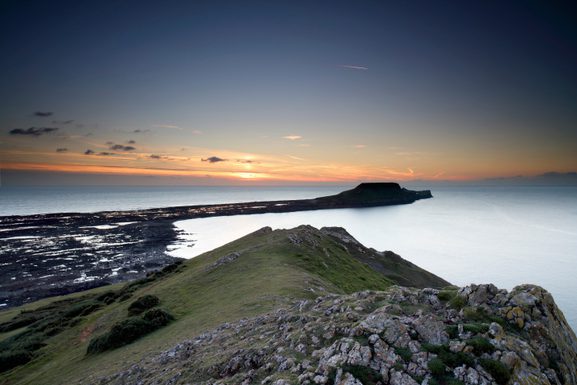 View of worm s head at sunset rhossili bay gower 2025 04 04 03 25 34 utc